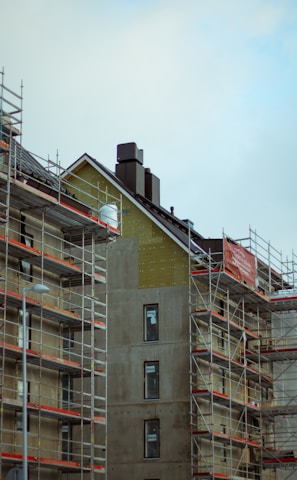 brown concrete building under white sky during daytime